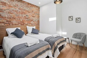 2 bedrooms, travel crib, WiFi, bed sheets