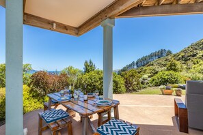 Outdoor dining - The Kereru's Nest. Overlooking the wonderful Tauranga Bay beach  (Kaeo)