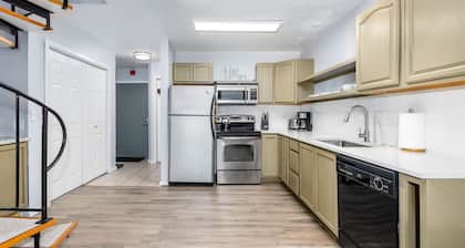 Condo with lanai, mountain view, fireplace, & spiral staircase