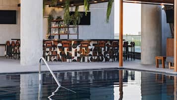 Outdoor pool, open 7:00 AM to 10:00 PM, cabanas (surcharge)