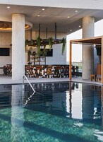 Outdoor pool, open 7:00 AM to 10:00 PM, cabanas (surcharge)