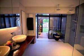 Bathtub, hair dryer, towels