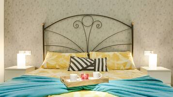 2 dormitorios, tabla de planchar con plancha, wifi gratis y ropa de cama