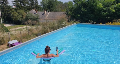 Idyllic setting with pool in Koppany Nature Park directly on the walking trails.