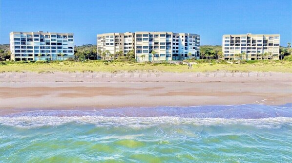 On the beach, sun-loungers, beach towels