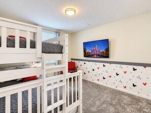 A bunk bed room with a Disney castle picture on the wall. - Family Disney Retreat / Entertainment Room / Console Provided (Kissimmee)