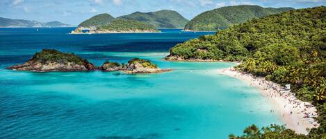 On the beach, sun loungers, beach towels