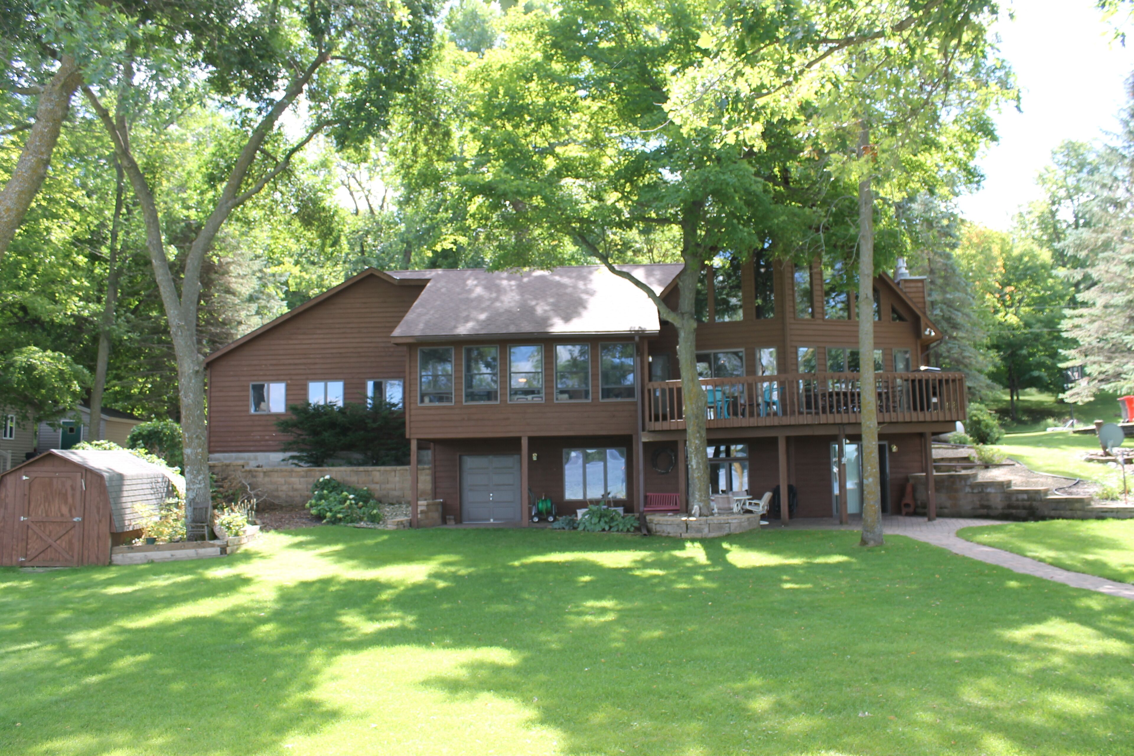 Beautiful 4 Bedroom Lake Home, on level lot, sandy beach, and beautiful views