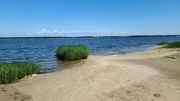 On the beach, sun-loungers, beach towels