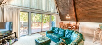 Charming, lakefront A-frame with private dock, lakeside gazebo, spacious deck