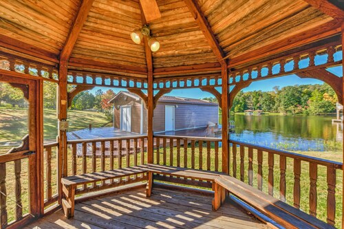 Charming, lakefront A-frame with private dock, lakeside gazebo, spacious deck