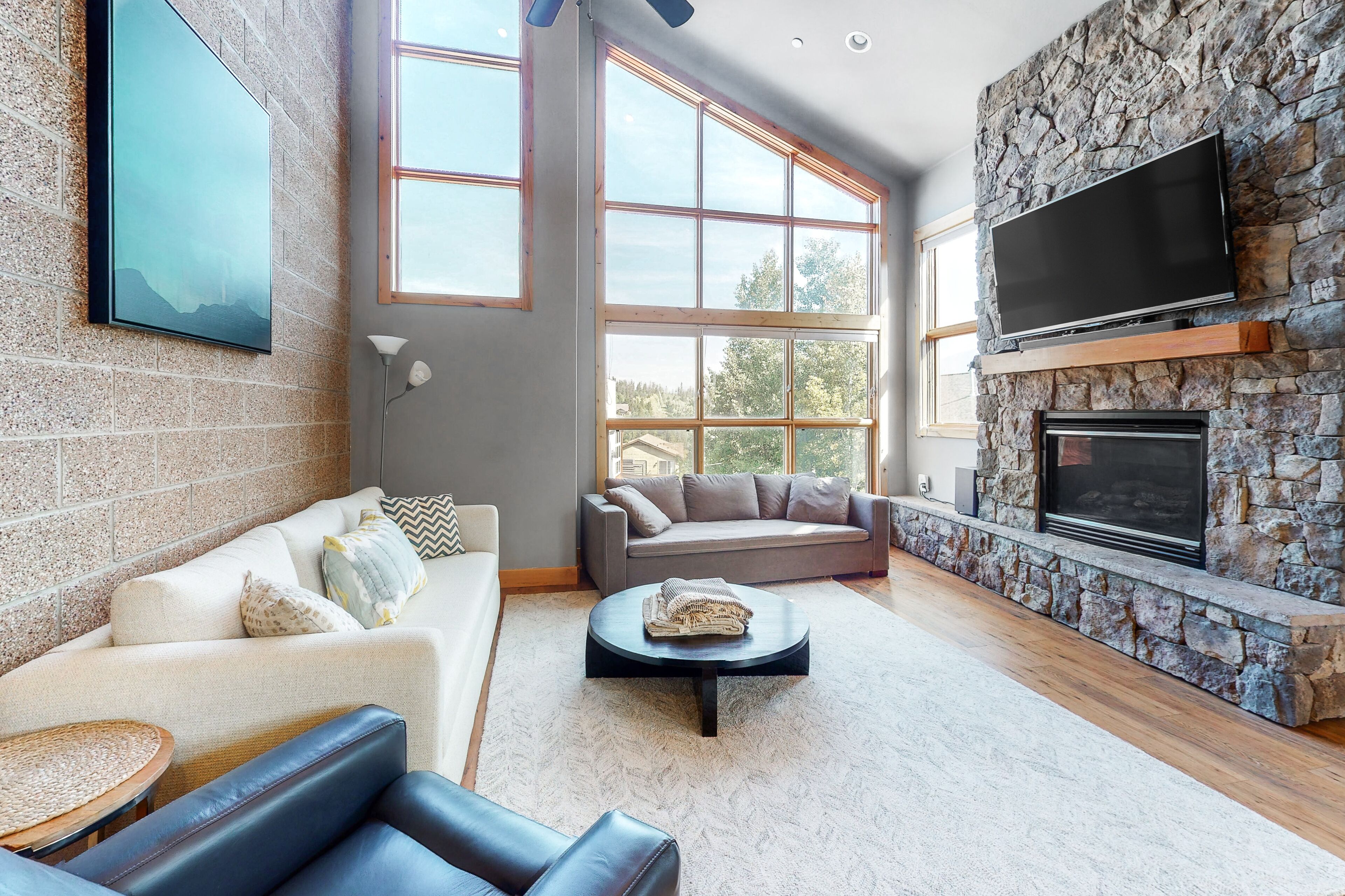 Sleek, stylish, & spacious home w/ a gas fireplace, furnished balcony, free WiFi