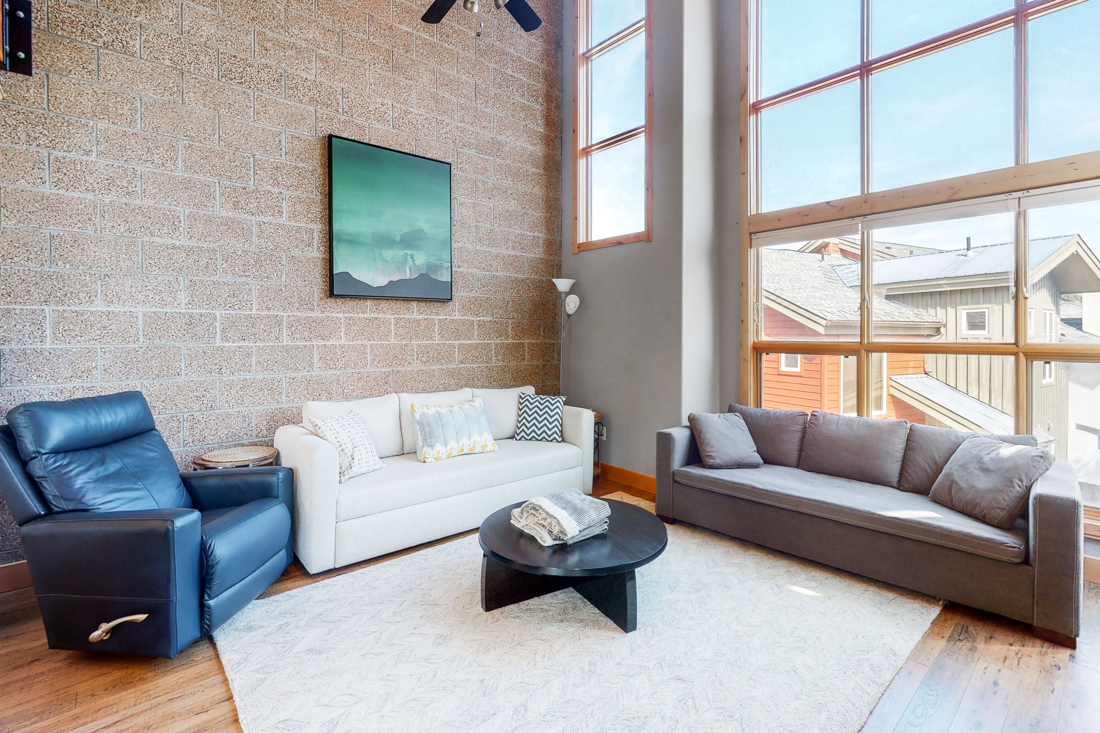 Sleek, stylish, & spacious home w/ a gas fireplace, furnished balcony, free WiFi