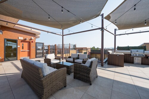 Pets Stay Free • King Bed • Walk to Downtown • Garage Parking • Elevator