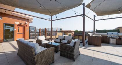 Pets Stay Free • King Bed • Walk to Downtown • Garage Parking • Elevator