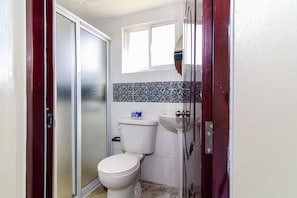 Bathtub, hair dryer, towels