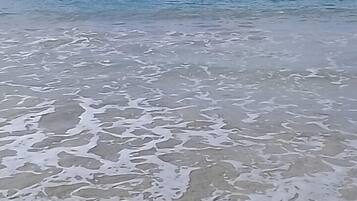 On the beach, sun-loungers, beach towels