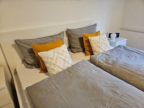 2 bedrooms, travel crib, WiFi, bed sheets