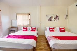 Suite familiale | Minibar, accès au Wi-Fi (inclus), literie fournie