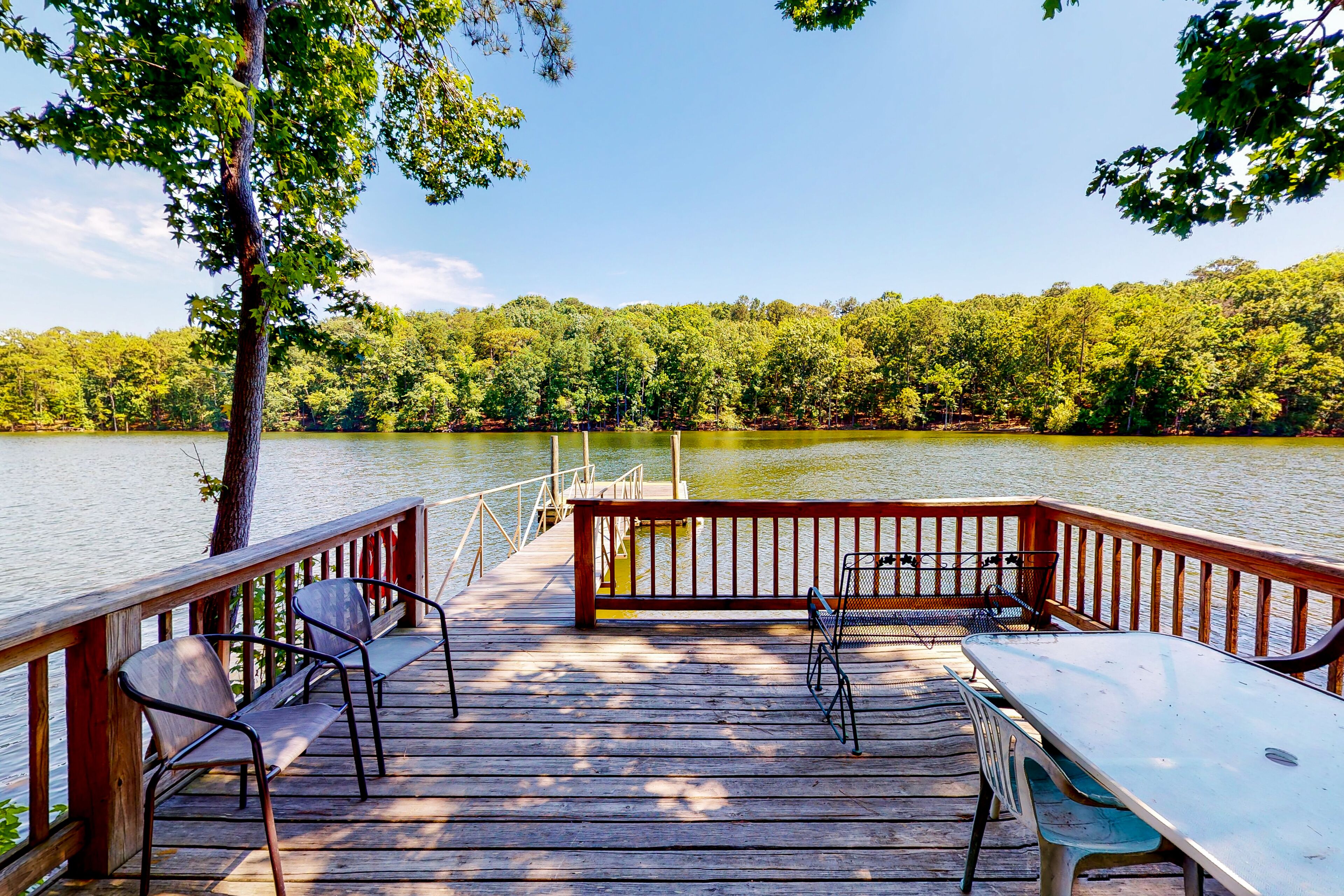 Dog-friendly, lakefront home w/ a private dock, furnished deck, & free WiFi