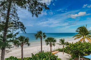 On the beach, sun loungers, beach towels