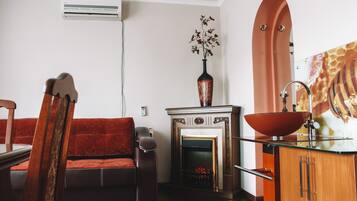 Individually decorated, desk, laptop workspace, iron/ironing board