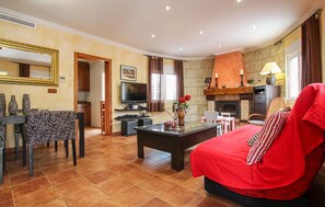 Una Smart TV, una chimenea