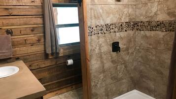 Combined shower/tub, hair dryer, towels, soap