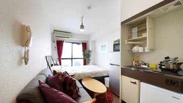 Apartment, Non Smoking | 1 bedroom, desk, blackout drapes, iron/ironing board