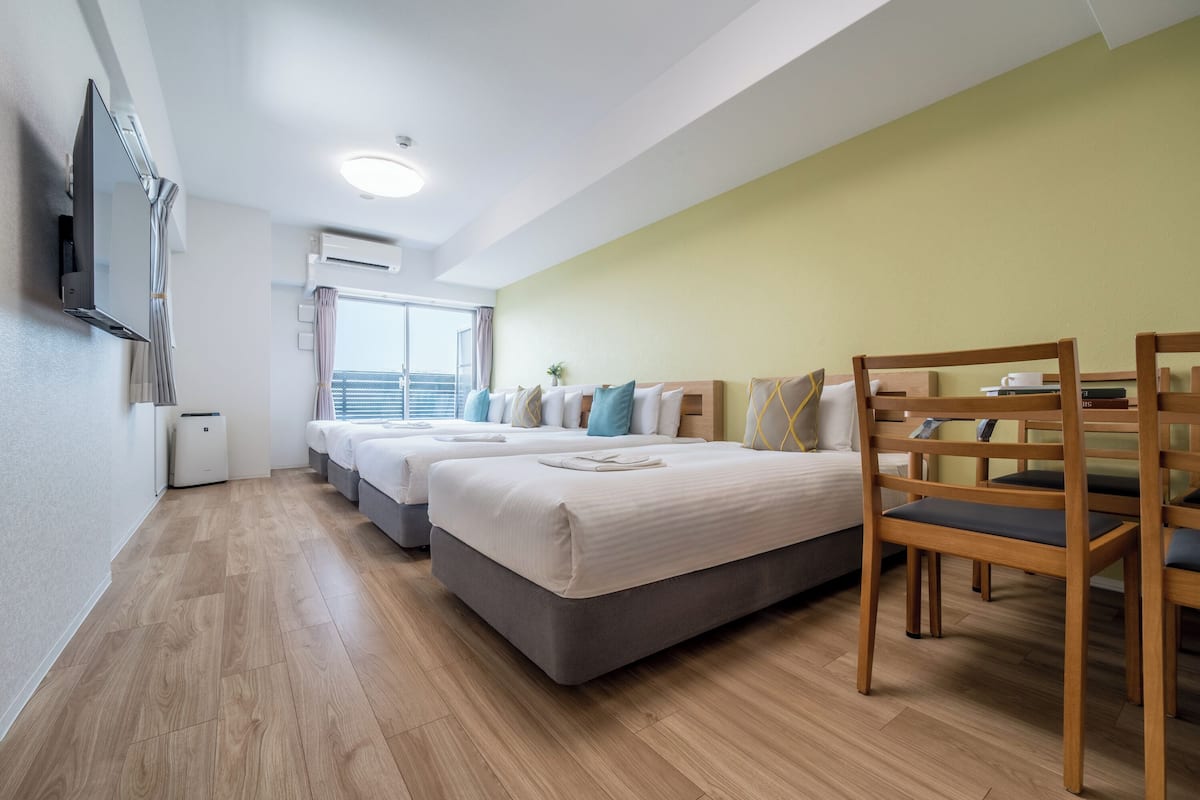 Deluxe Quadruple Room, Multiple Beds, Non Smoking, City View