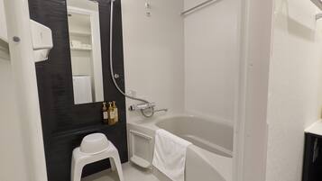 Separate bathtub and shower, free toiletries, hair dryer, slippers
