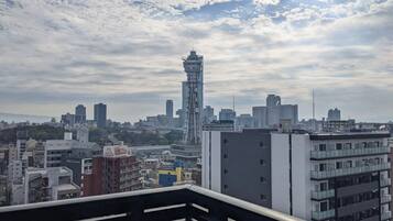 Kamar Quadruple Deluks, Beberapa Tempat Tidur, Bebas Asap Rokok, pemandangan kota | Pemandangan dari kamar