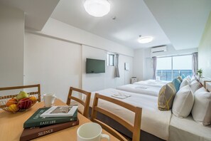 Deluxe Quadruple Room, Multiple Beds, Non Smoking, City View | Living area | 43-inch flat-screen TV with digital channels, TV - Eslead Hotel Namba South Ⅲ (Osaka)