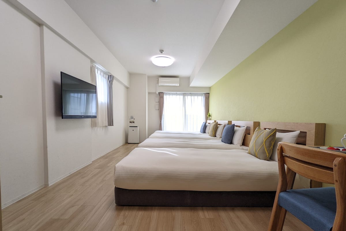 Deluxe Quadruple Room, Multiple Beds, Non Smoking, City View