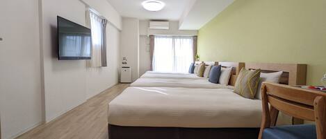 Premium bedding, blackout curtains, iron/ironing board, cots/infant beds