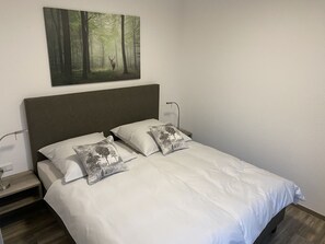 2 habitaciones, caja de seguridad en la habitación y cuna de viaje