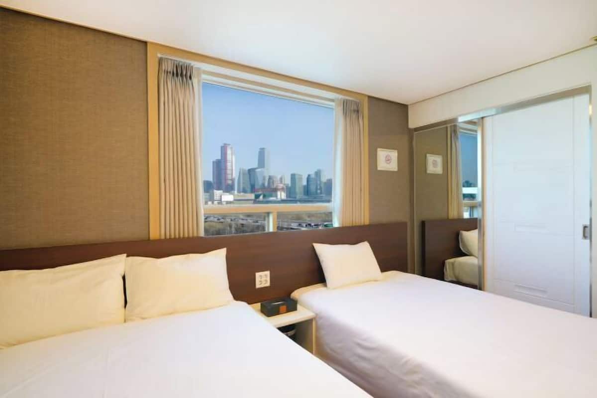 Blackout curtains, soundproofing, free WiFi, bed sheets