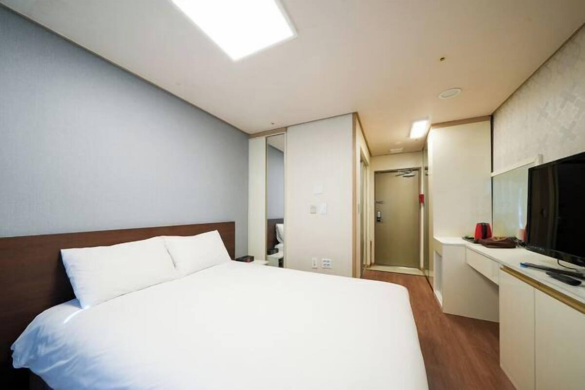 Blackout curtains, soundproofing, free WiFi, bed sheets