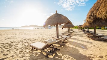 On the beach, free beach shuttle, sun loungers, beach umbrellas