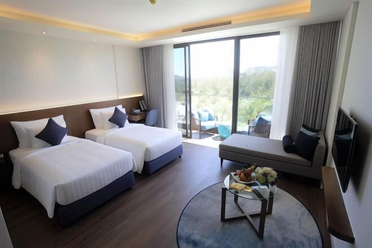 2 habitaciones, minibar y caja de seguridad en la habitación