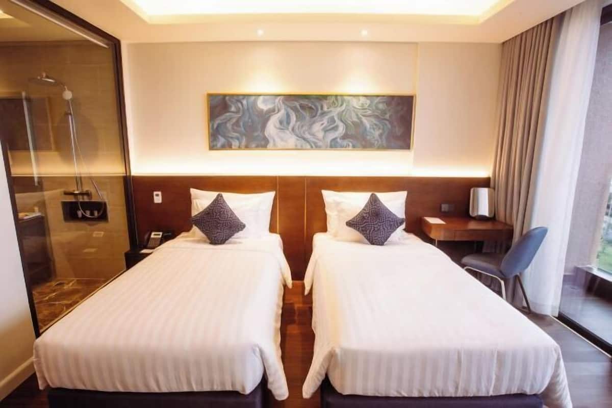 2 habitaciones, minibar y caja de seguridad en la habitación