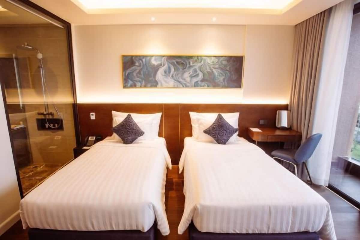 2 habitaciones, minibar y caja de seguridad en la habitación