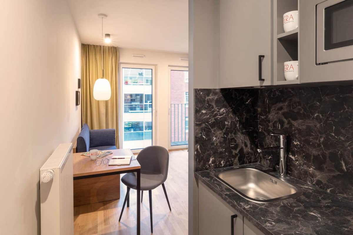 Monolocale (Cosy Apartment) | Area soggiorno | Smart TV 43 pollici con canali via cavo, TV, pavimenti riscaldati