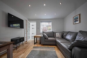 Cottage | Living area | Flat-screen TV - Oasis Cottage (Whitby)