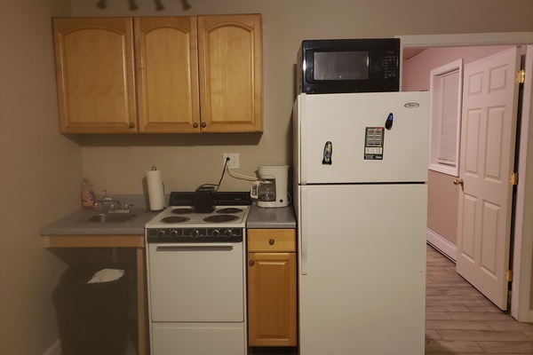 Refrigerador, microondas, horno y parrilla de estufa