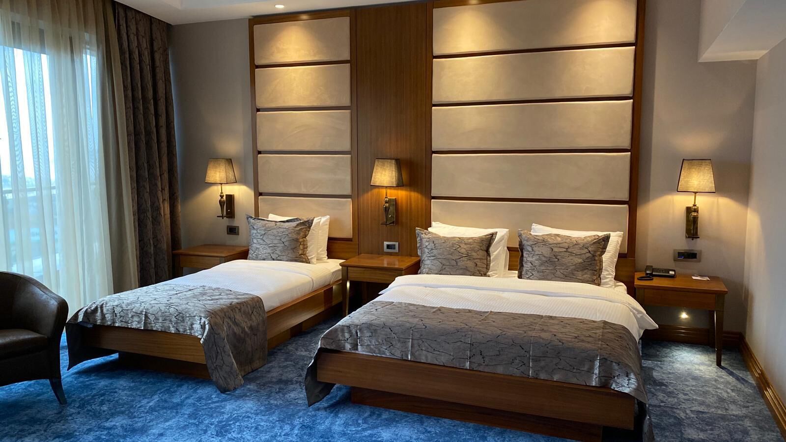 family room, multiple beds, non smoking, sea view | minibar, in-room safe, desk, laptop workspace