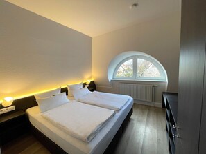 Suite familiar | 1 dormitorio, ropa de cama de alta calidad, minibar