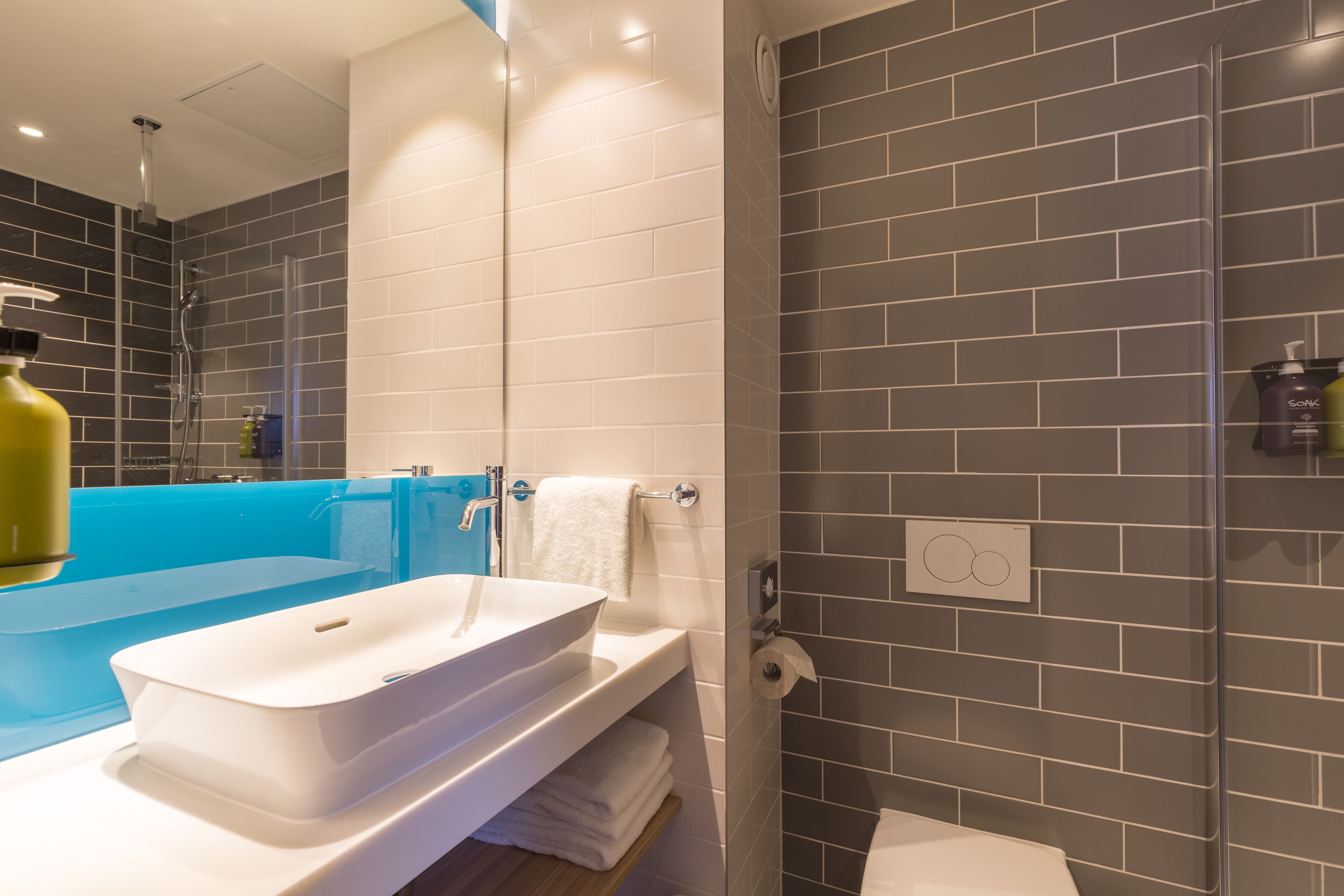 shower, free toiletries, hair dryer, towels