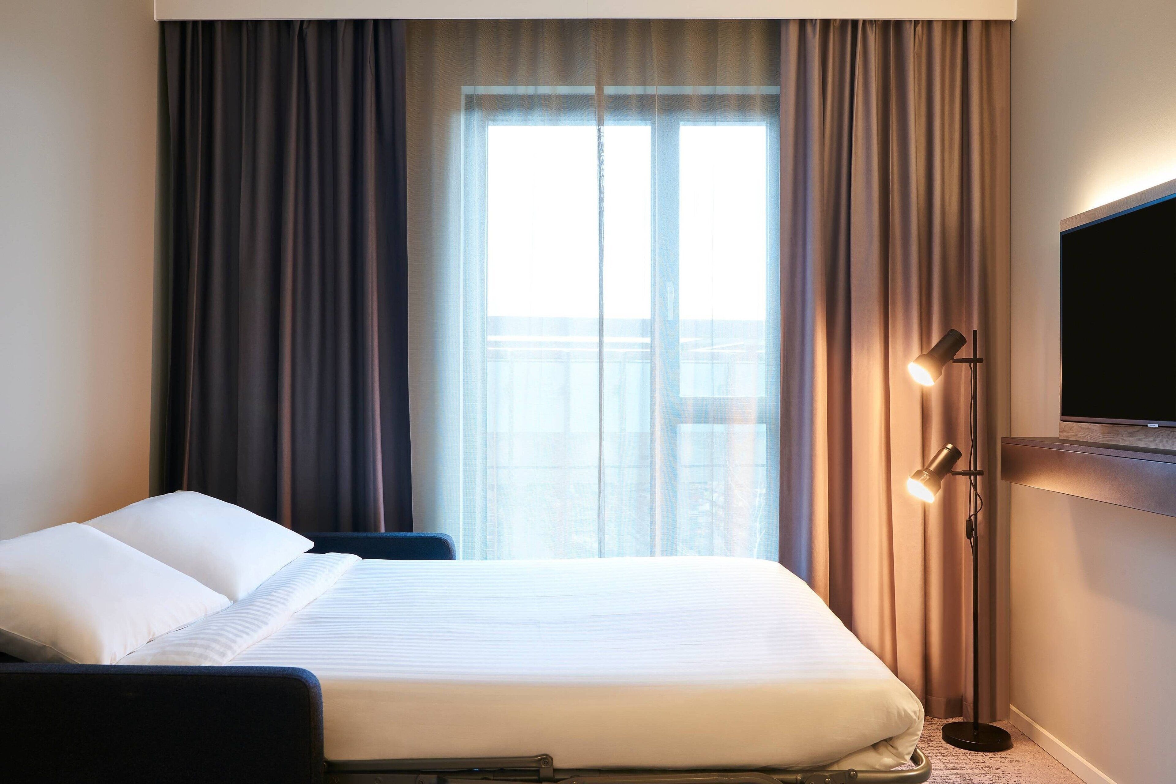 family room, 1 queen bed with sofa bed, non smoking | desk, laptop workspace, free wifi, bed sheets