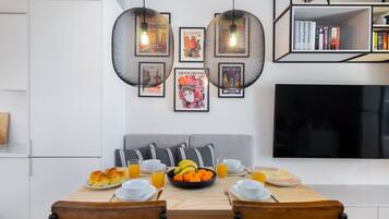 Apartment, 1 Bedroom | Living area | TV